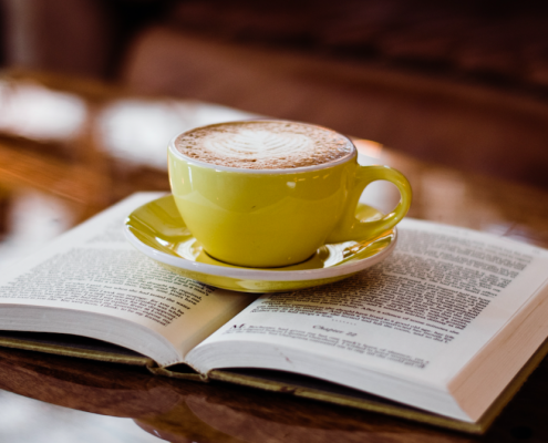GoFisch book club with coffee mug