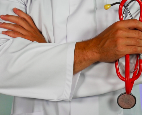 doctor holding stethoscope